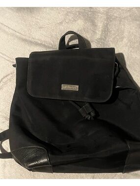 Apostrophe Black Nylon Flap Backpack with Leather Trim some wear on corner.